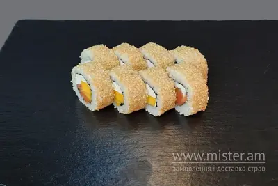 Каліфорнія з лососем та манго в кунжуті Це SUSHI & PIZZA undefined фото