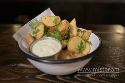 Картопляні скибочки з зеленню та часником Belfast Pub undefined фото