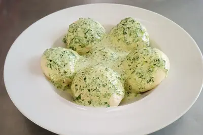 Галушки з куркою під шпинатним соусом Мюнхен undefined фото