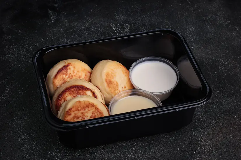 Сheese pancakes with sour cream and condensed milk - "Myastoriya Meat Bar Lavina Shopping Mall" in Kyiv photo