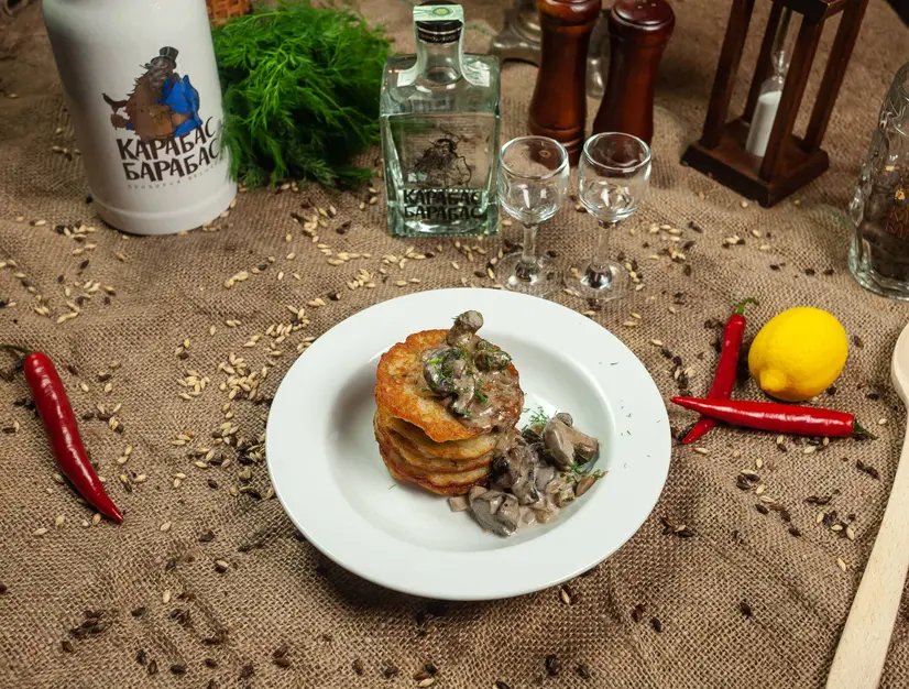 Деруни з грибним соусом - "Карабас Барабас на вул.Виниченка" в Луцьку фото