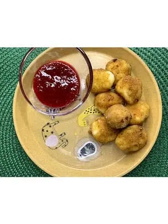 Сирні кульки з малиновим соусом Dacha undefined фото