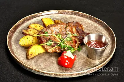 Стейк зі свинини з картоплею та соусом BBQ Crazy Land undefined фото