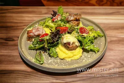 Свинні медальйони з сиром та сушеними томатами Trattoria undefined фото