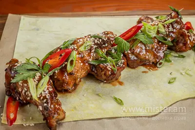 Курячі крильця під фірмовим соусом BBQ Реберня "На Вогні" undefined фото
