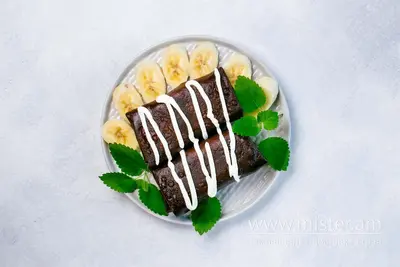 Млинці шоколадні з сиром, бананом та шоколадно-горіховим кремом Multi Cook undefined фото