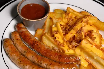 Ковбаски гриль з картопляними діпами під сирним соусом Вульф undefined фото