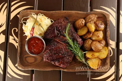 Стейк Рібай з печеною картоплею і салатом з капусти Ribs House undefined фото