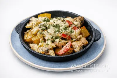 Гаряча пательня з картоплею та курячі крильця Taverna undefined фото