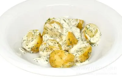 Молода картопля з маслом, сметаною та зеленню Курінь Ресторація undefined фото