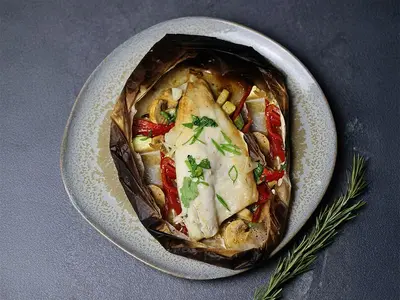 Сібас в конверті з овочами та соком юзу Yoki restaurant undefined фото