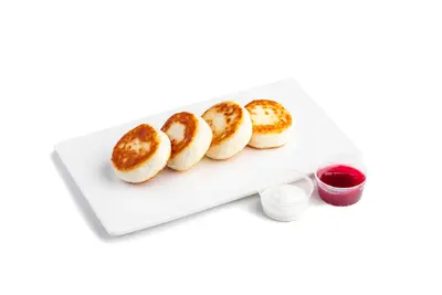 Сирники з ягідним соусом та сметаною Real Roll undefined фото
